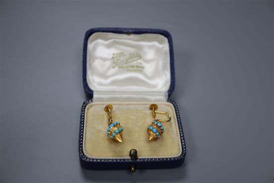 A pair of yellow metal (tests as 15ct) and turquoise set pear shaped drop ear clips, 17mm, gross 4 grams.